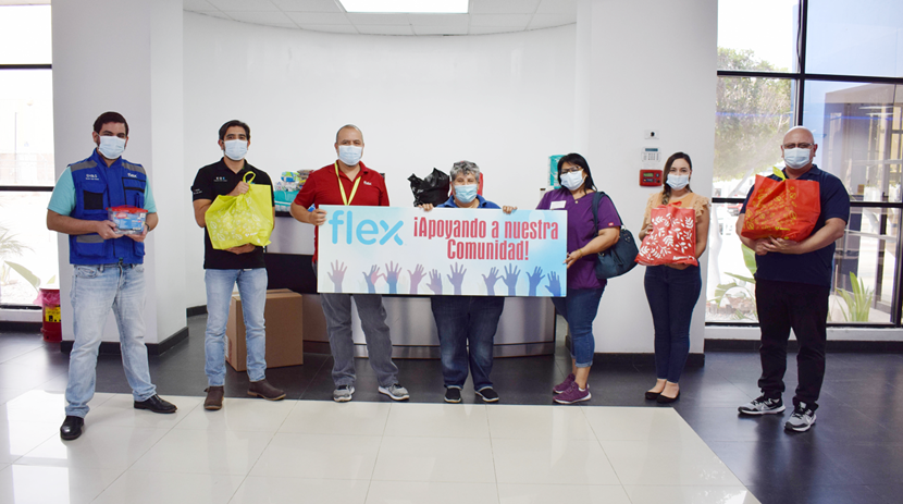 flex employees in Mexico display lgbtq banner indoors
