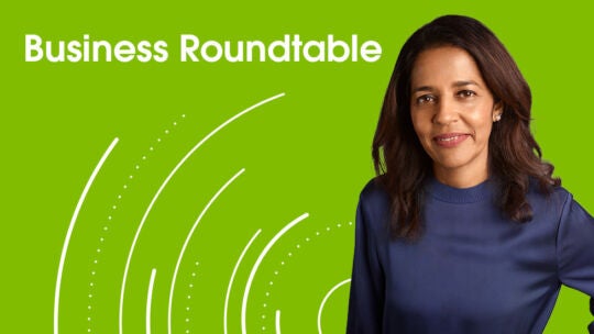green banner with words business roundtable and an image of revathi advaithi