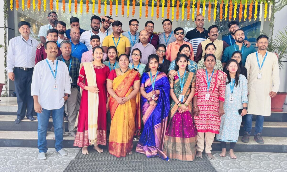 Large group of Flex employees in India standing together