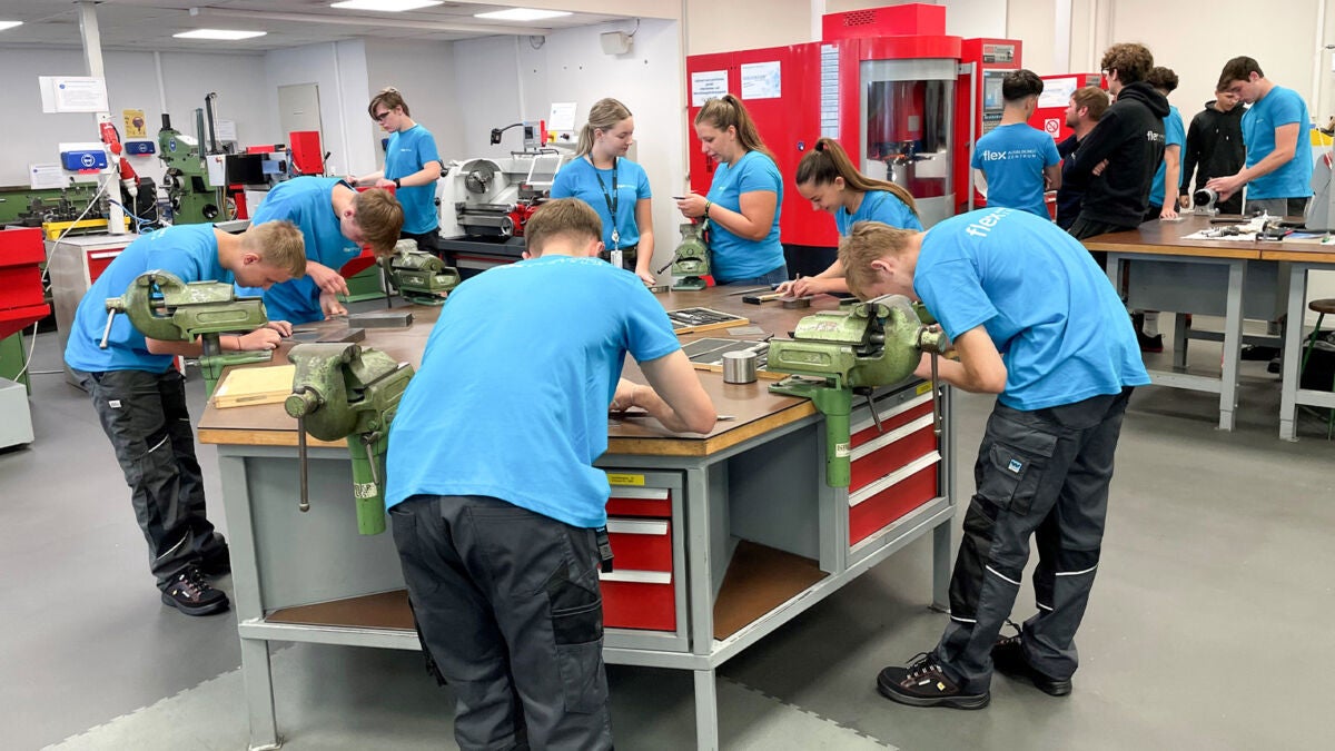 Austria technical apprentices working around a table