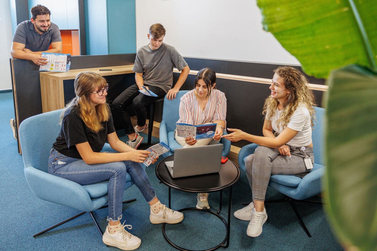 flex interns in a meeting
