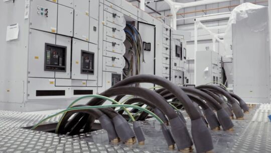 Power cords in a data center floor