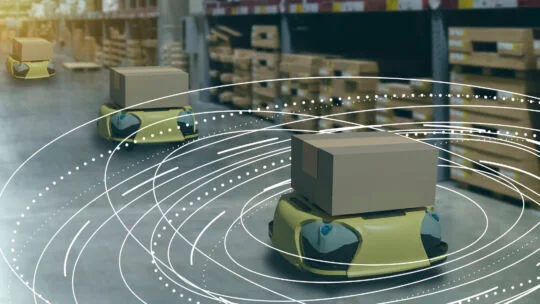 robots on an industrial warehouse floor