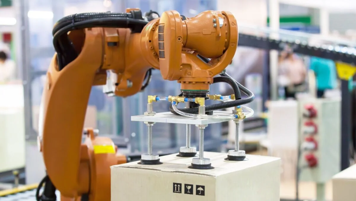 Robotic arm holding a package