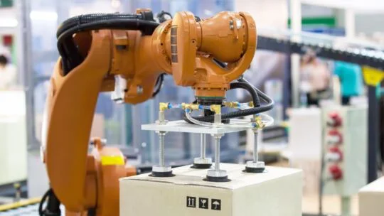 Robotic arm holding a package