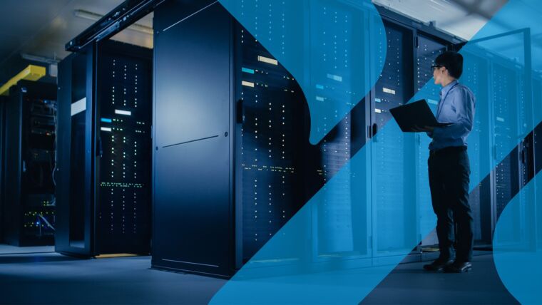 Person monitoring AI data center efficiency with PUE