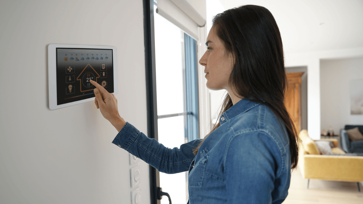 Woman using a smart home appliance